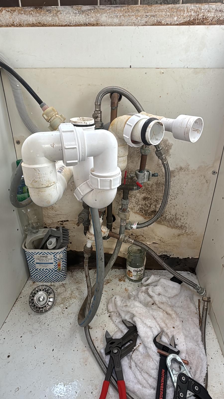 Before: Kitchen Sink Plumbing